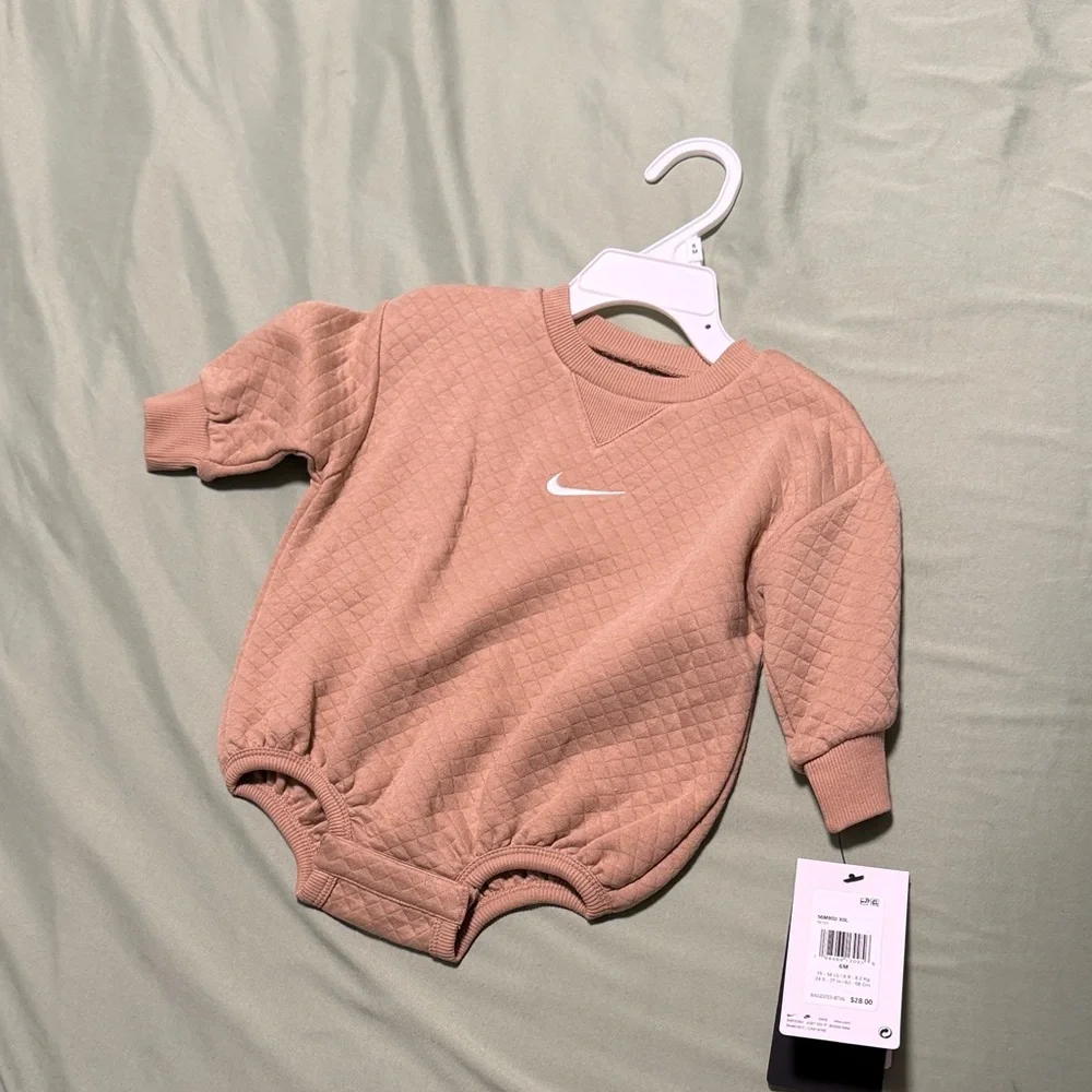 Nike Quilted Baby Bodysuit in Dusty Rose